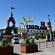 The entrance of Legoland reveals a Danish flag next to a gateway made of Lego bricks